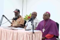 Sekretaris Komisi Keadilan dan Perdamaian (SKP), Rudolf Kambayong bersama uskup keuskupan Timika, Mgr. Bernardus Bofitwos Baru, OSA, didampingi oleh Ketua SKP Keuskupan Timika, Saul Wanimbo